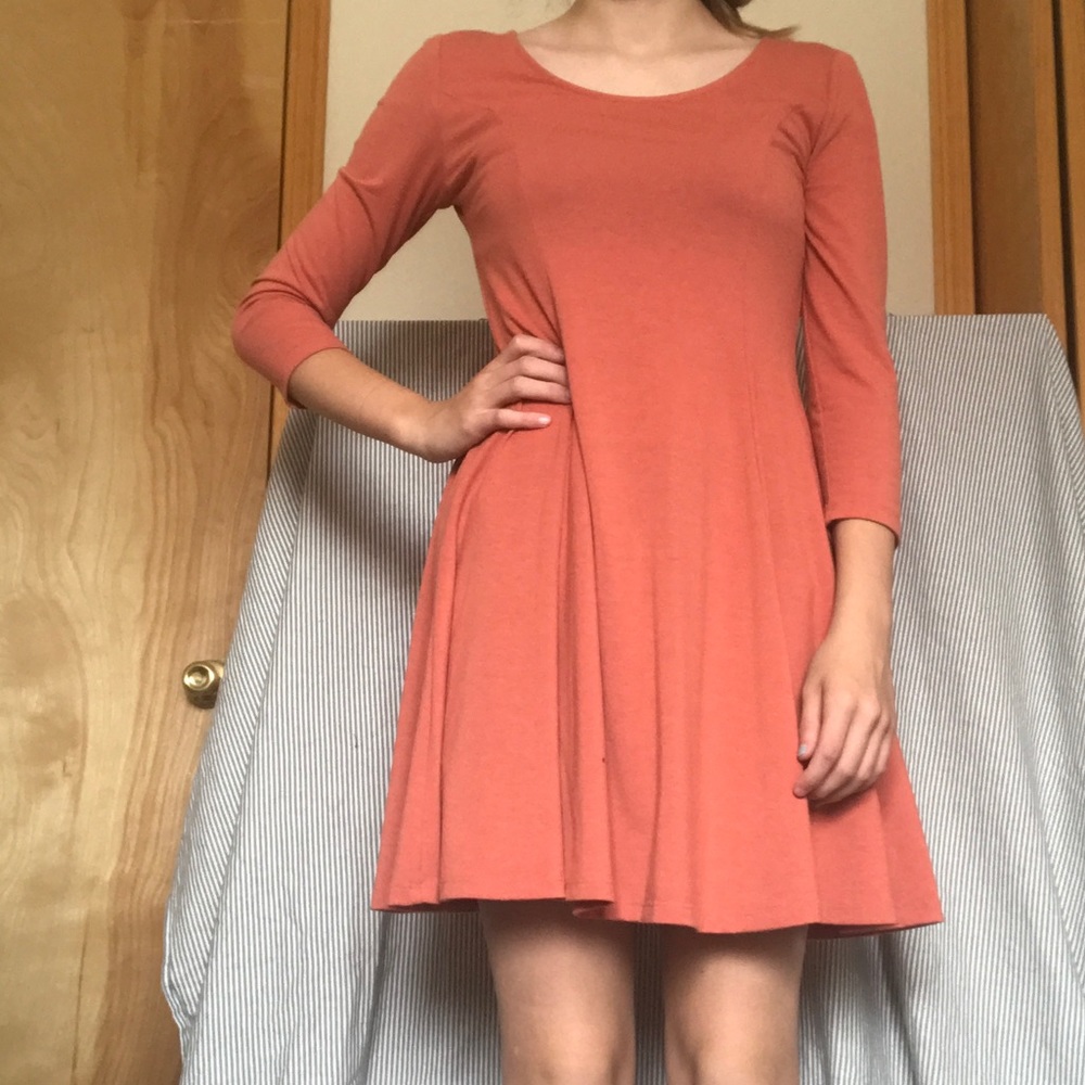Orange Form Fitting Long Sleeve Dress